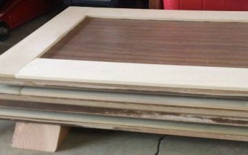 stack of cabinet doors with trim attached
