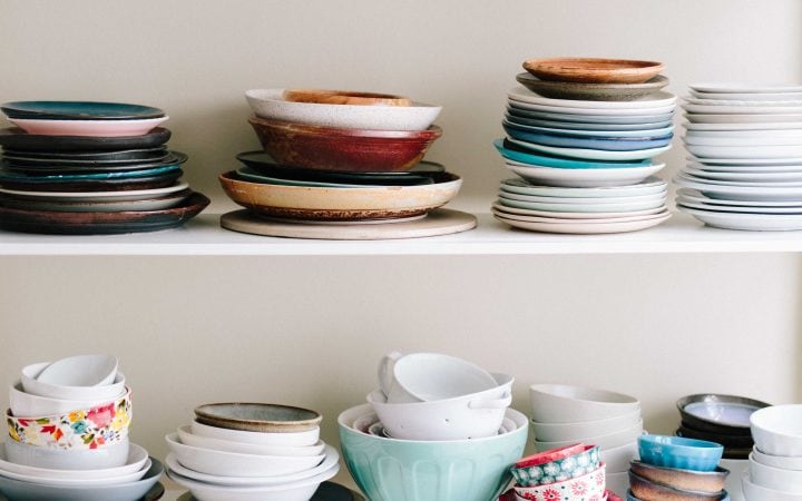 dishes-stacked-on-shelves